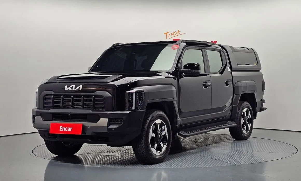 Kia Tasman — фото 1