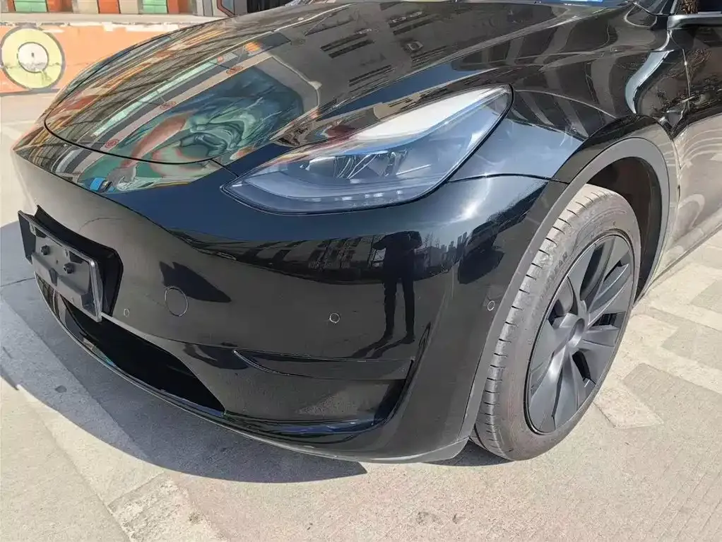 Tesla Model Y — фото 10