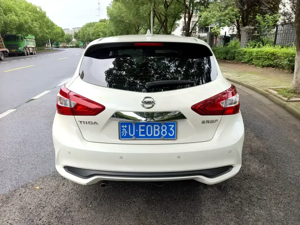 Nissan Tiida — фото 4
