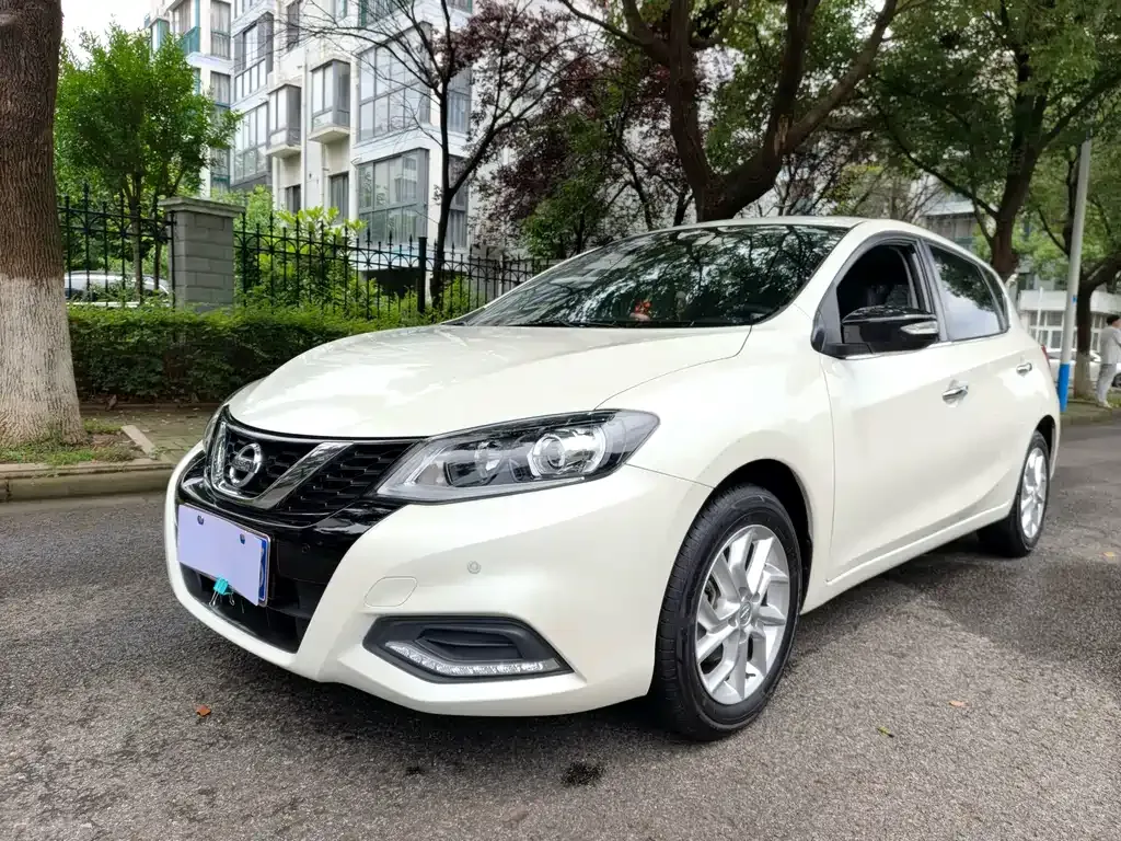 Nissan Tiida — фото 7