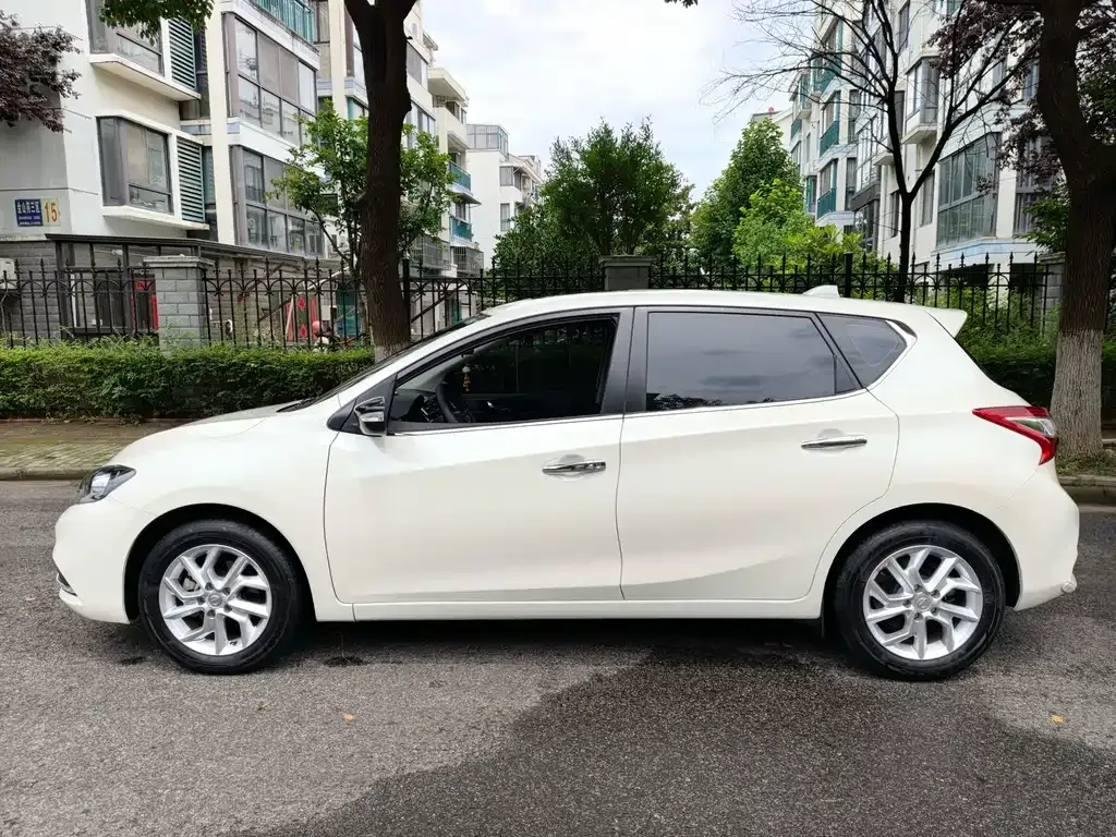 Nissan Tiida — фото 10