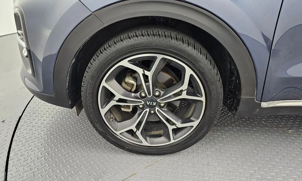 Kia Sportage — фото 9