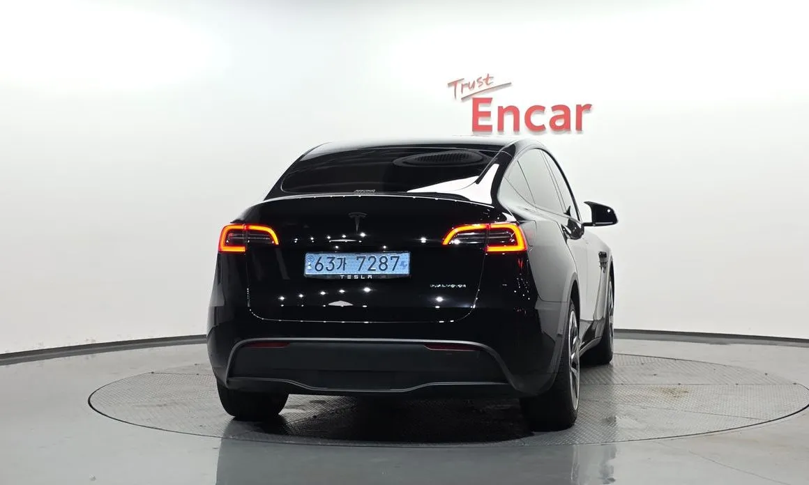 Tesla Model Y — фото 7