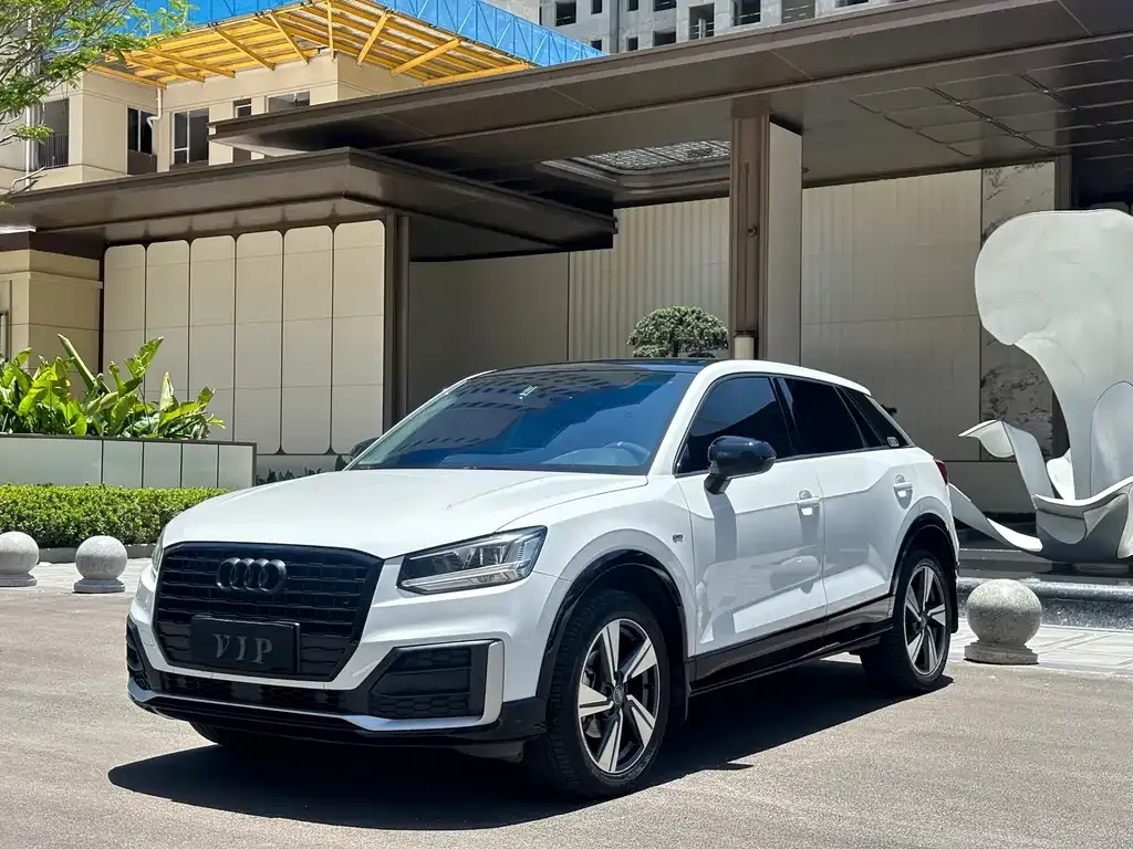 Audi Q2L — фото 4