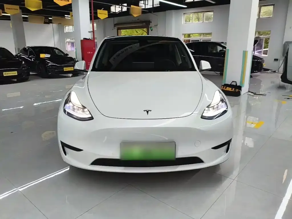 Tesla Model Y — фото 7