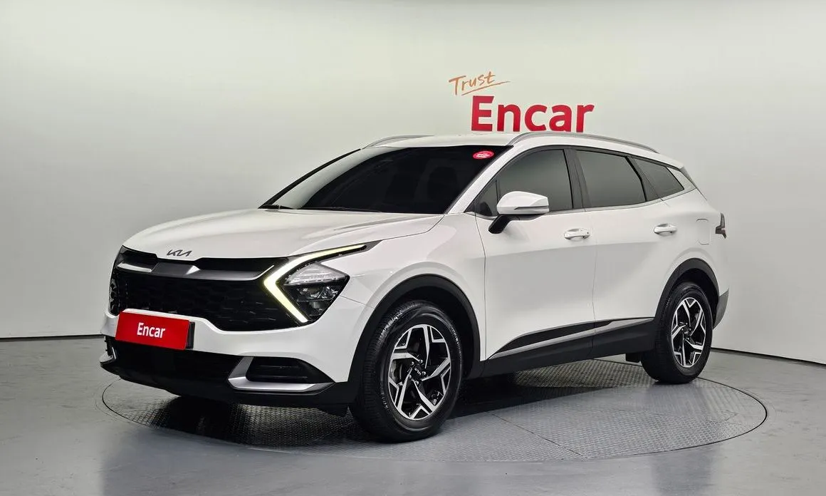 Kia Sportage — фото 1