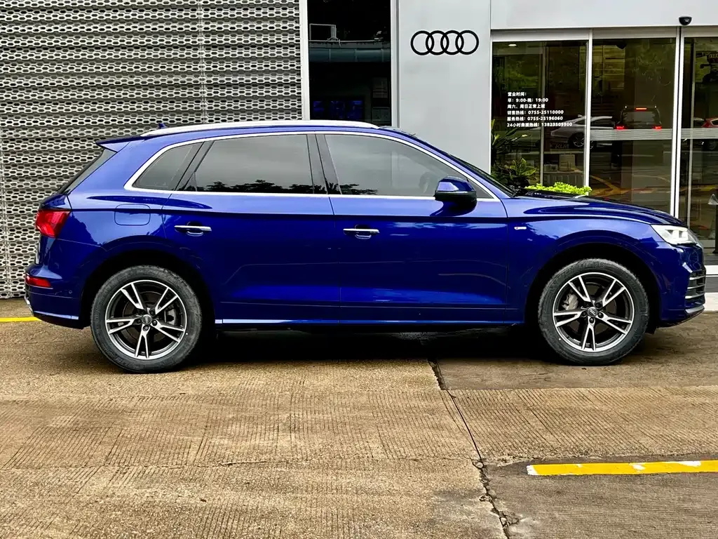 Audi Q5L — фото 7