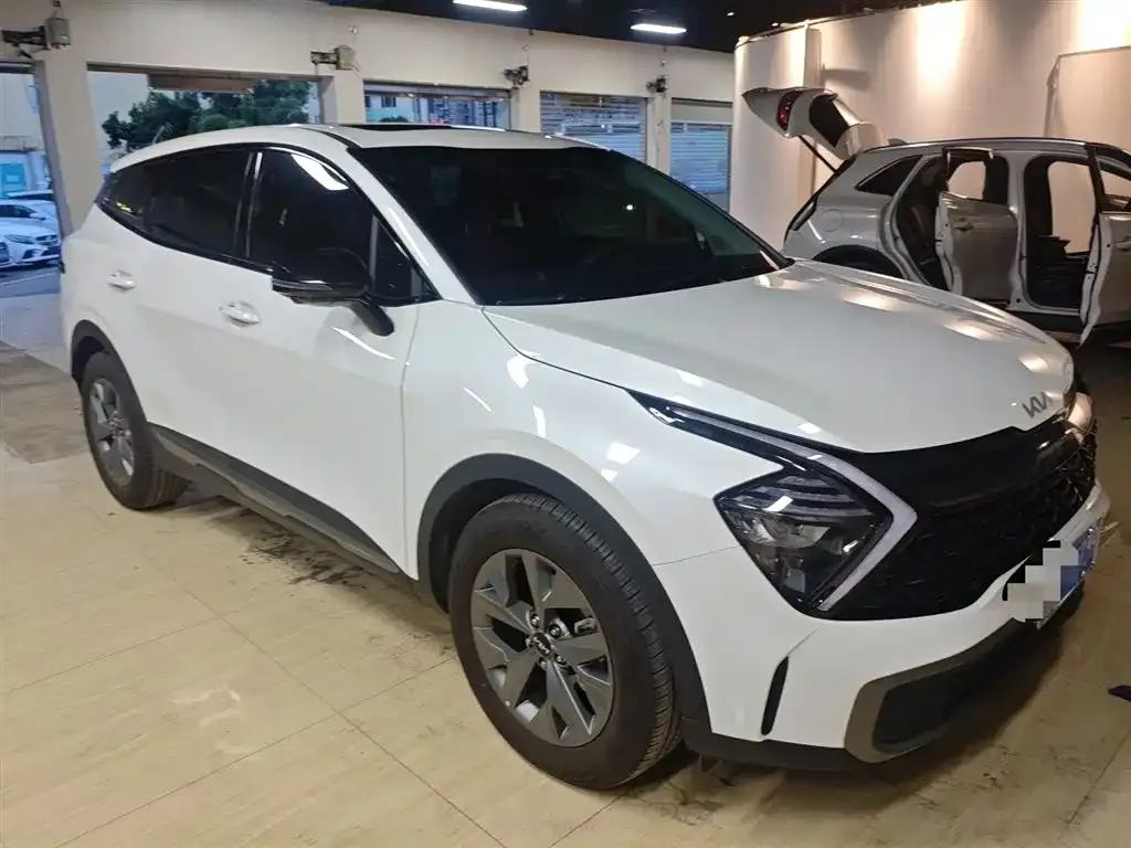 Kia Sportage — фото 1