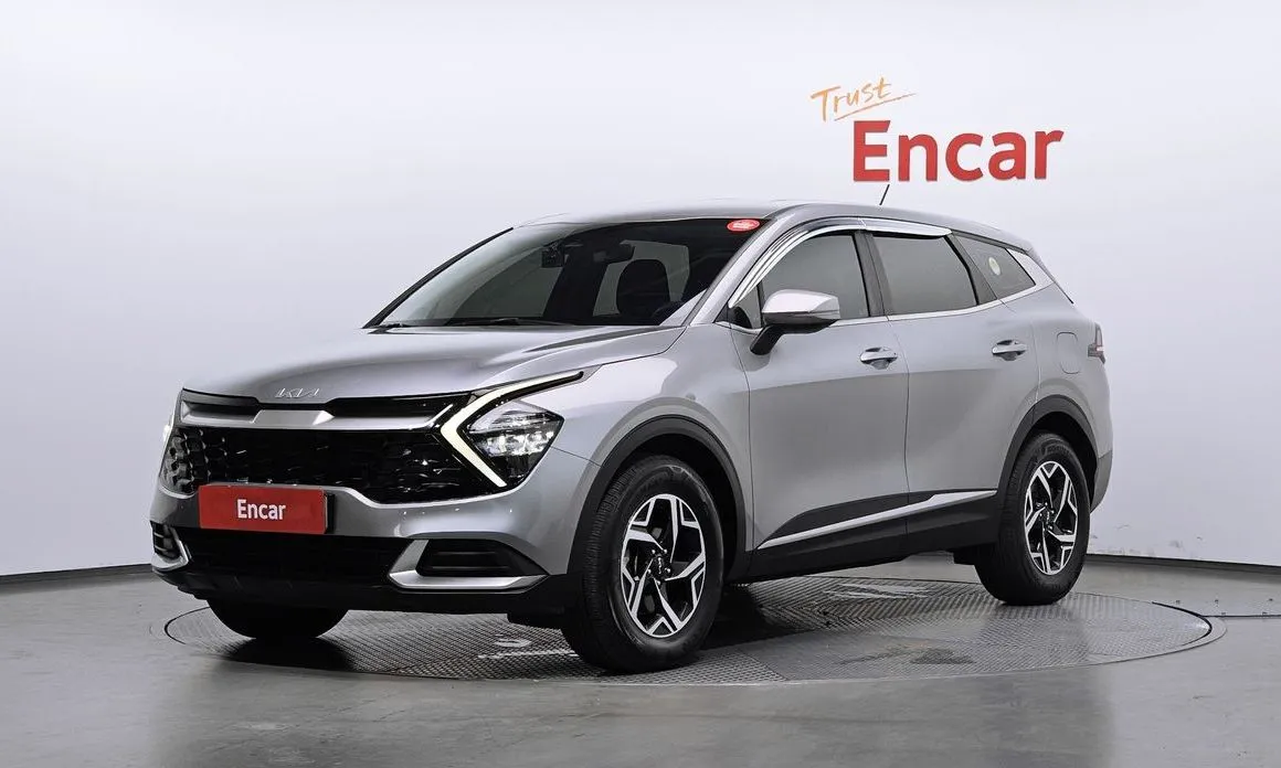 Kia Sportage — фото 1