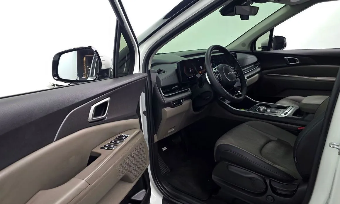 Kia Carnival — фото 10