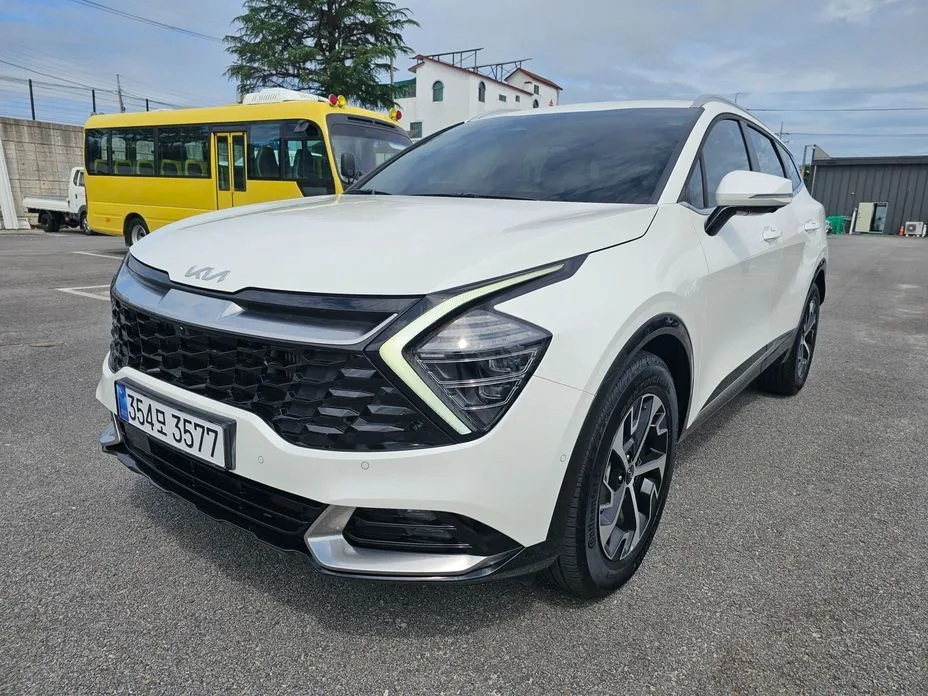 Kia Sportage — фото 8