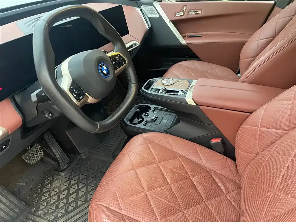 BMW iX M60 — фото 10