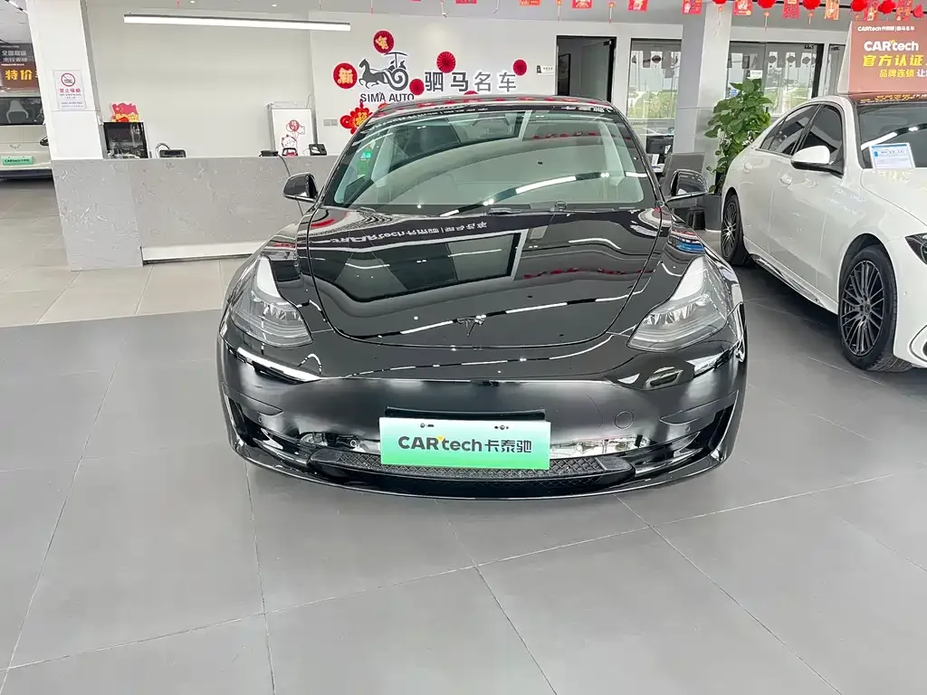 Tesla Model 3 — фото 6
