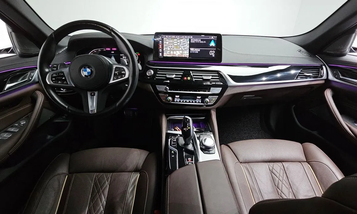 BMW 5-Series — фото 10