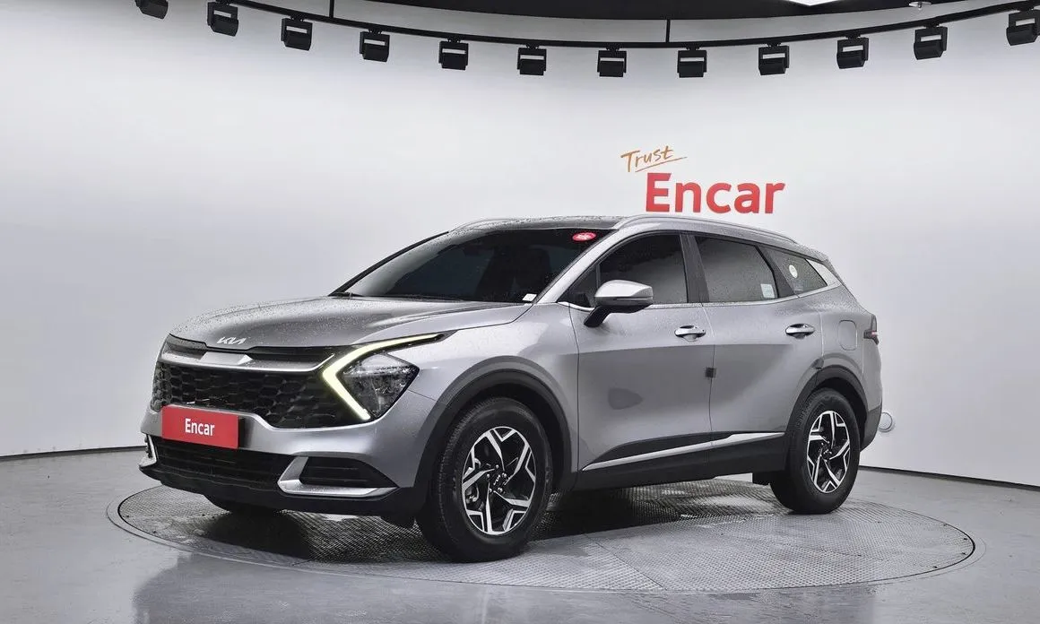 Kia Sportage — фото 1