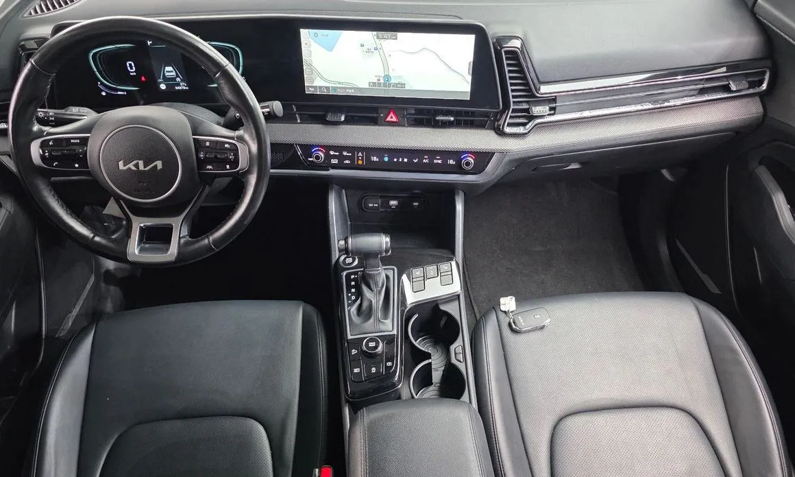 Kia Sportage — фото 9