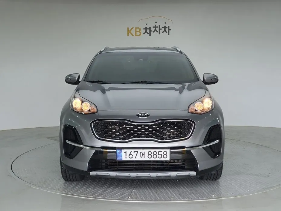 Kia Sportage — фото 1