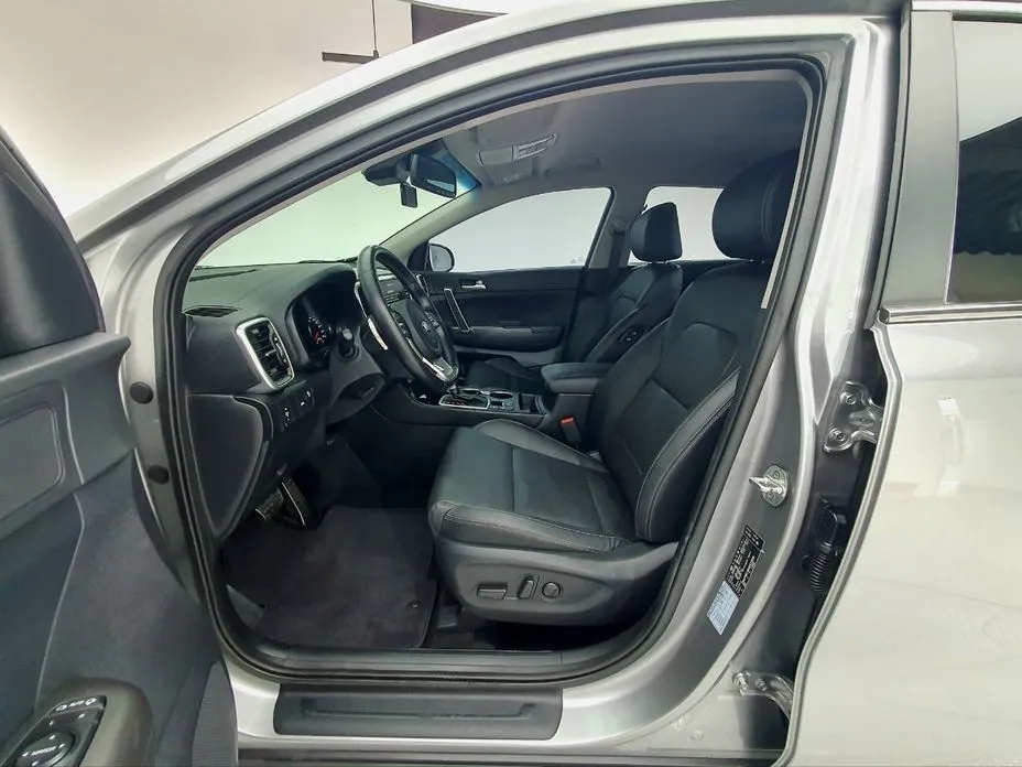 Kia Sportage — фото 8