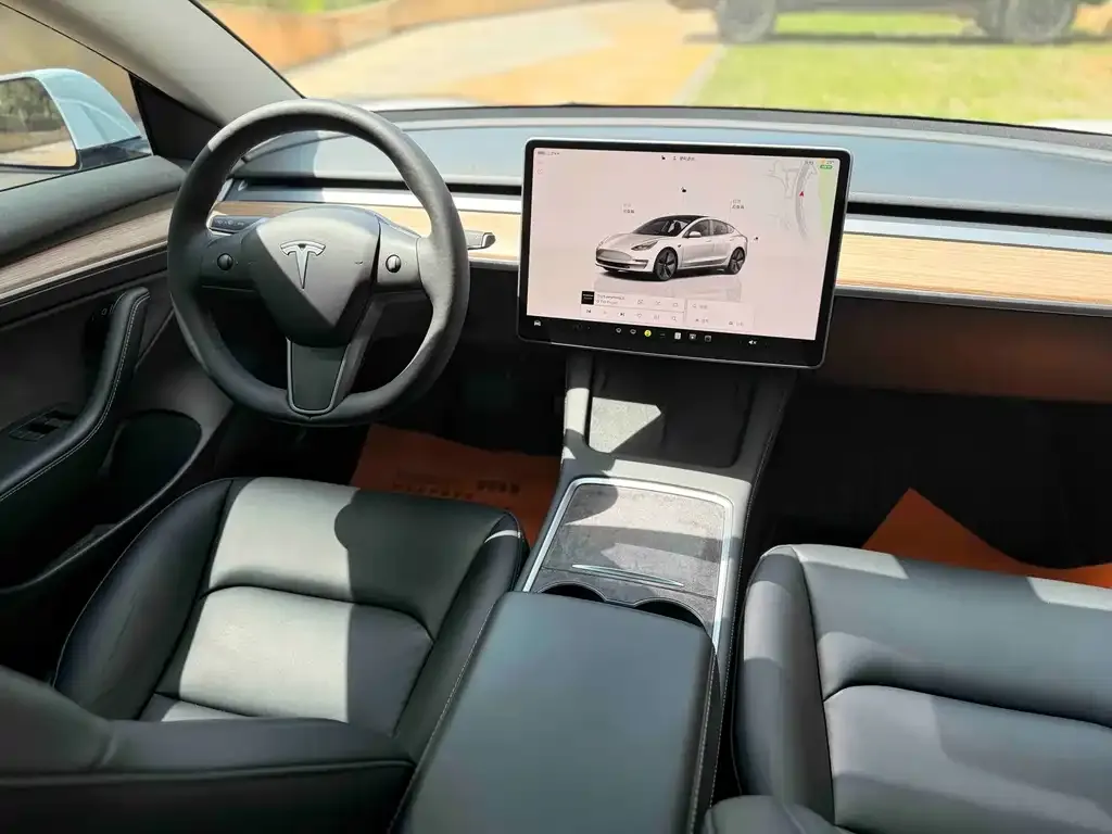 Tesla Model 3 — фото 10