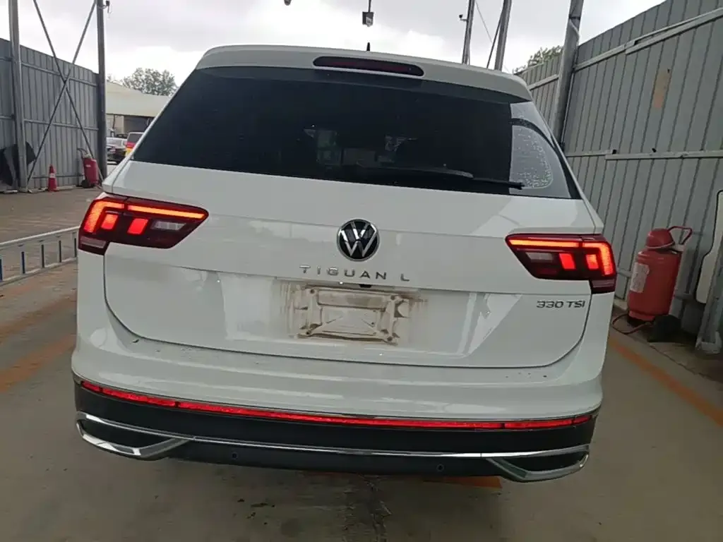 Volkswagen Tiguan L — фото 4