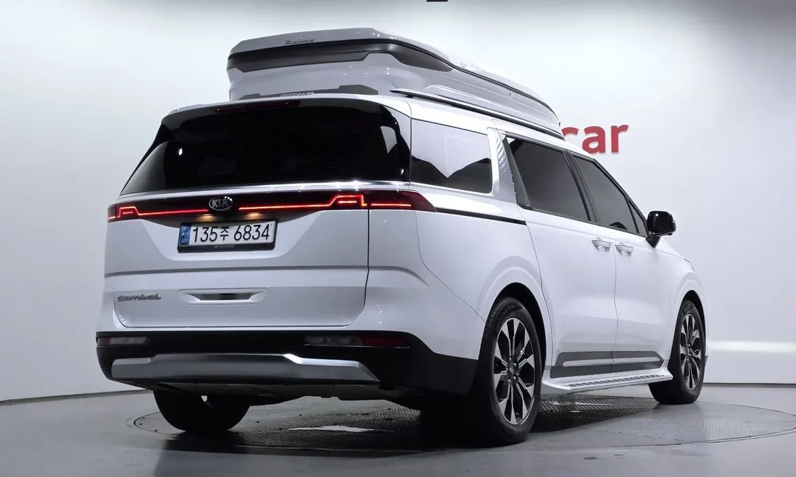 Kia Carnival — фото 10