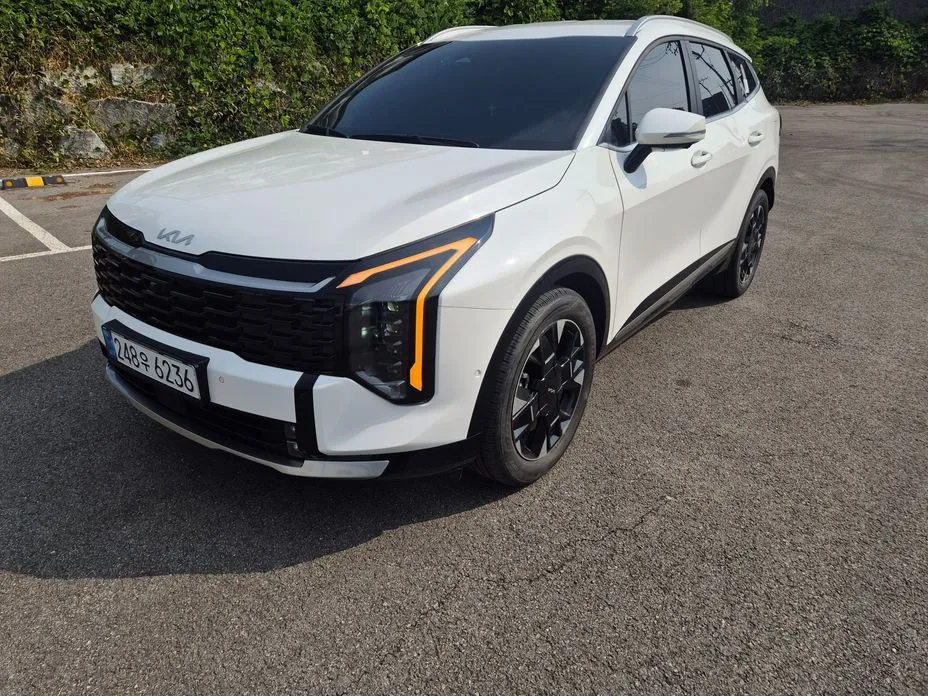Kia Sportage — фото 1