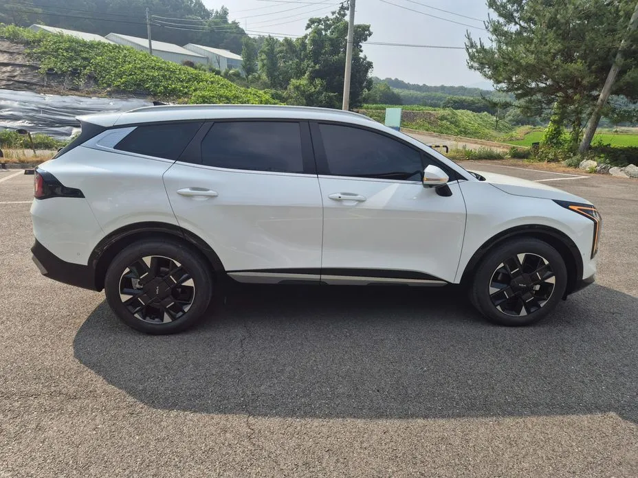 Kia Sportage — фото 10