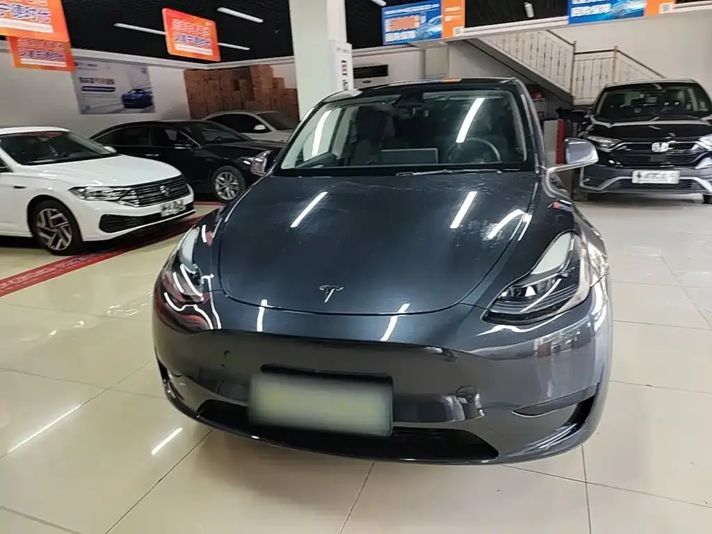 Tesla Model Y — фото 8