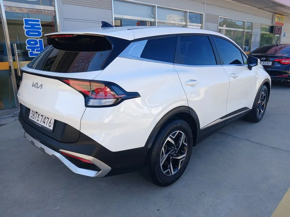 Kia Sportage — фото 7