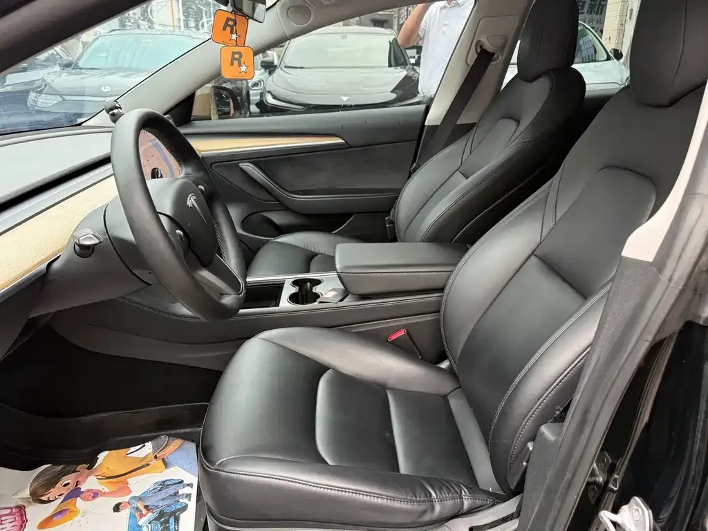 Tesla Model 3 — фото 5