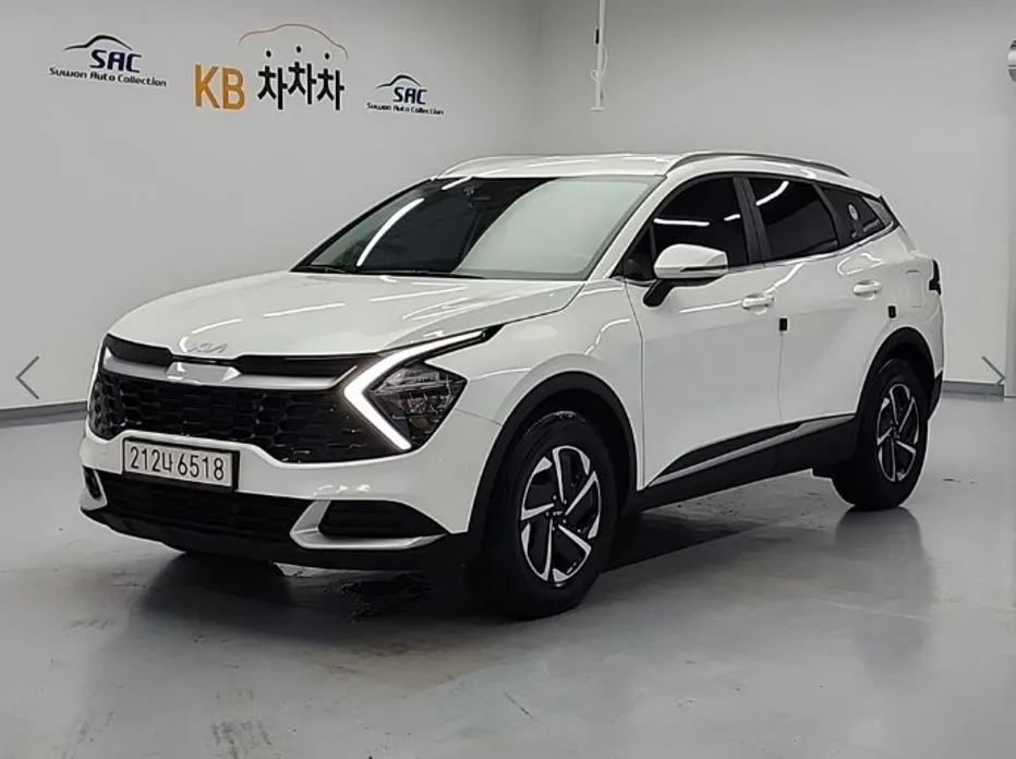 Kia Sportage — фото 1