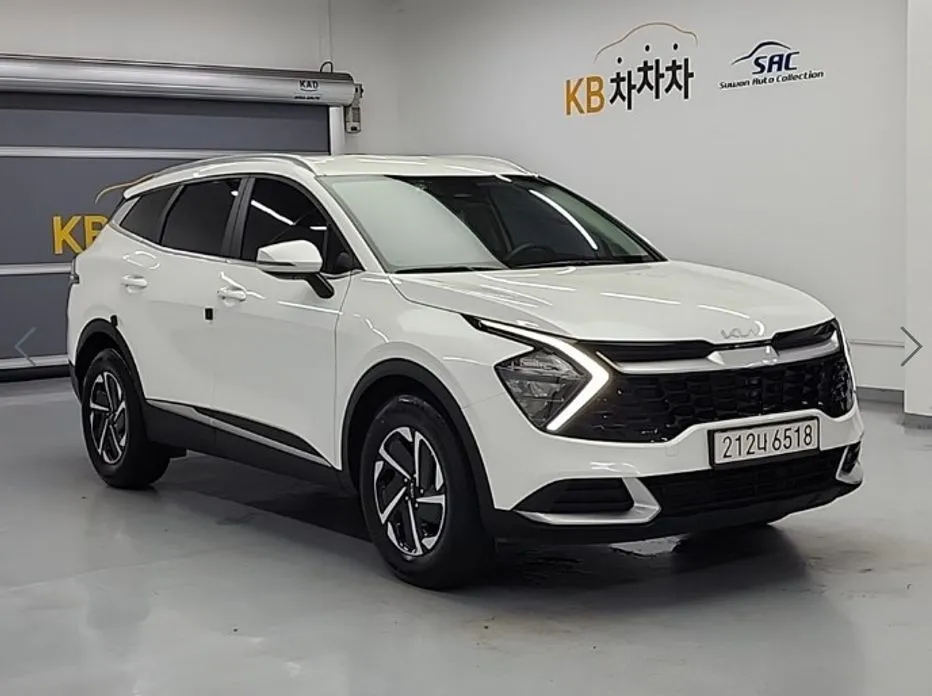 Kia Sportage — фото 8