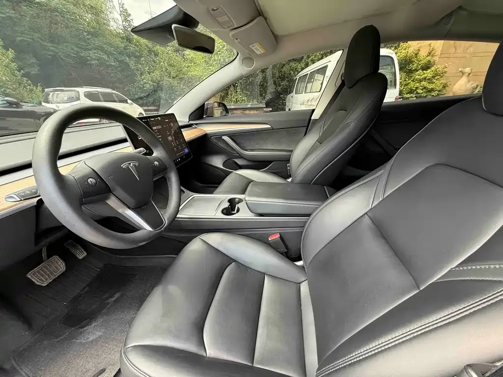 Tesla Model 3 — фото 10