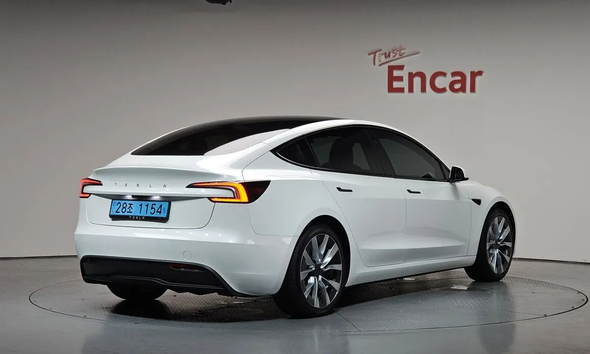 Tesla Model 3 — фото 7