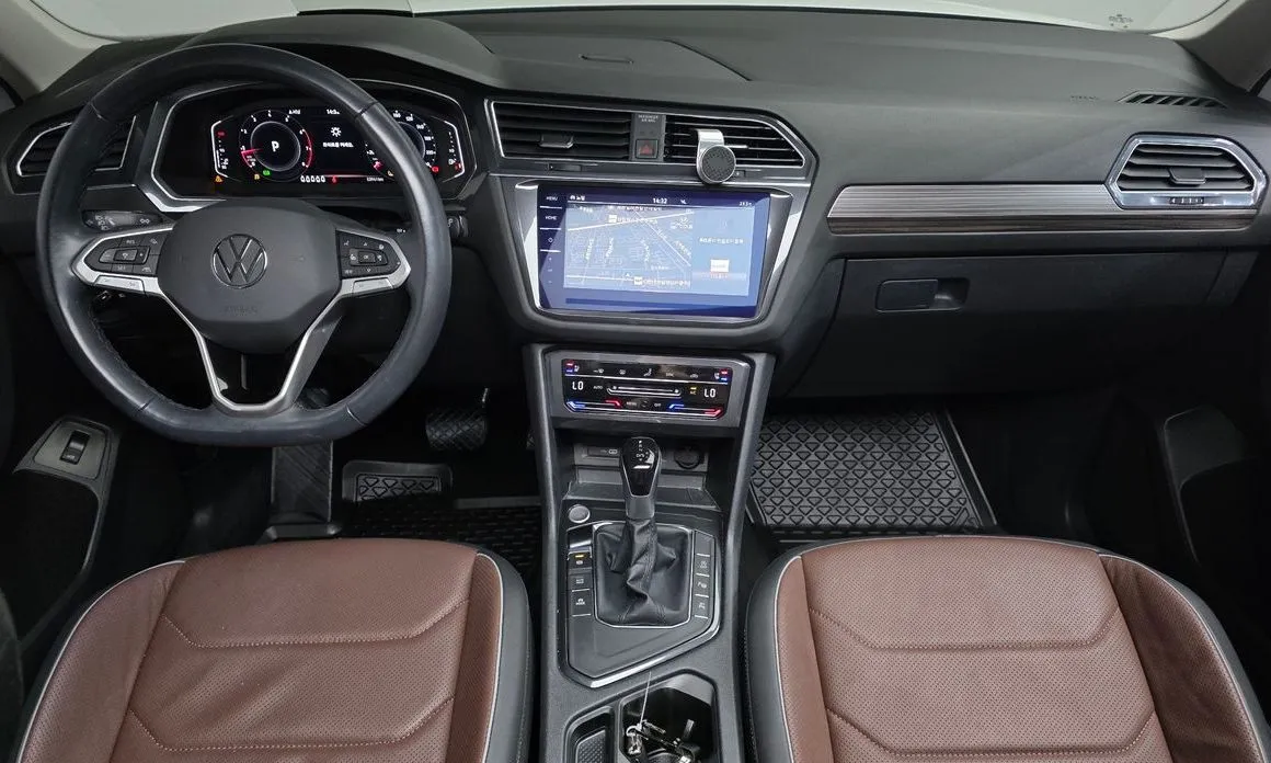 Volkswagen Tiguan — фото 10