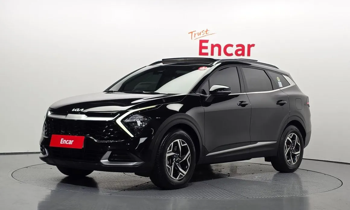 Kia Sportage — фото 1