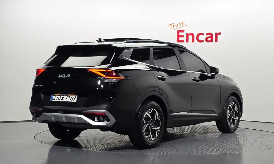 Kia Sportage — фото 10