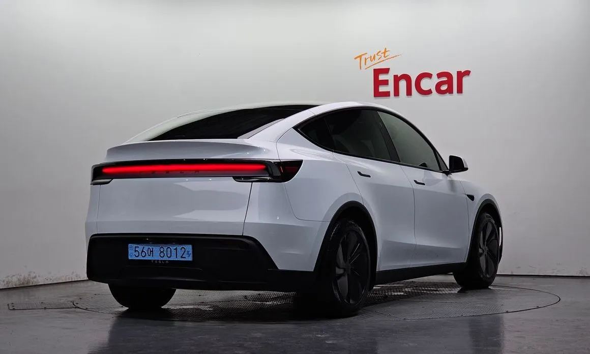 Tesla Model Y — фото 8