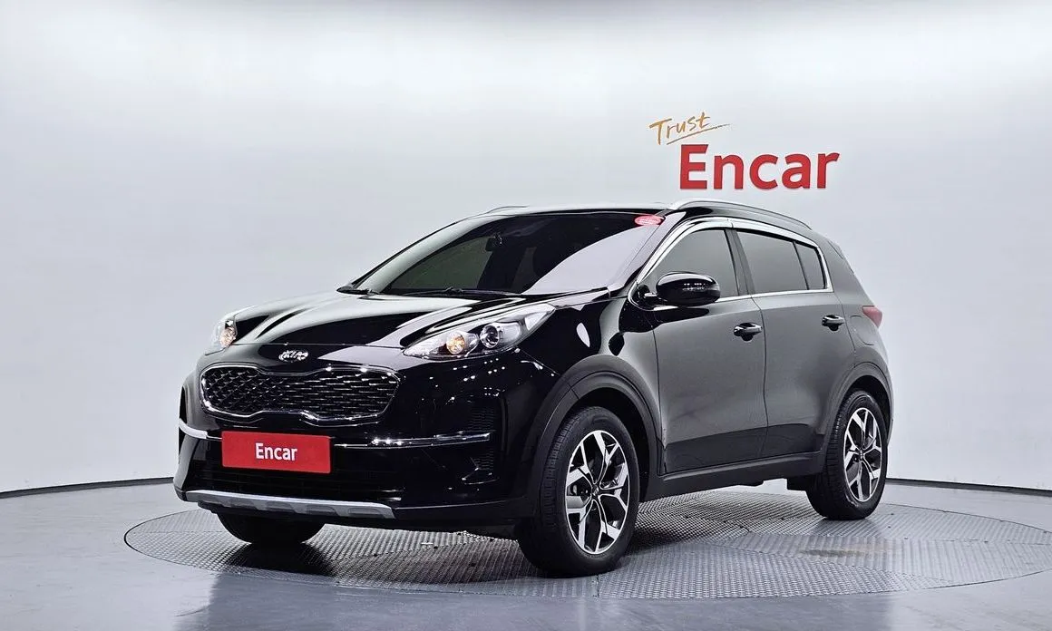 Kia Sportage — фото 1