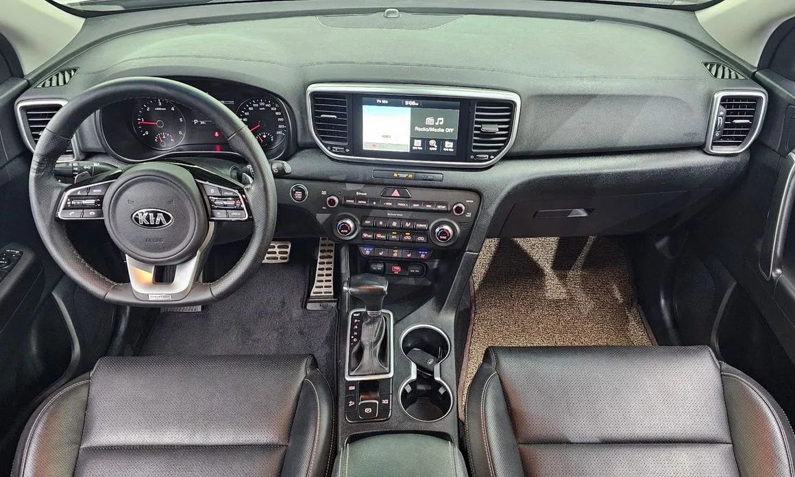 Kia Sportage — фото 9