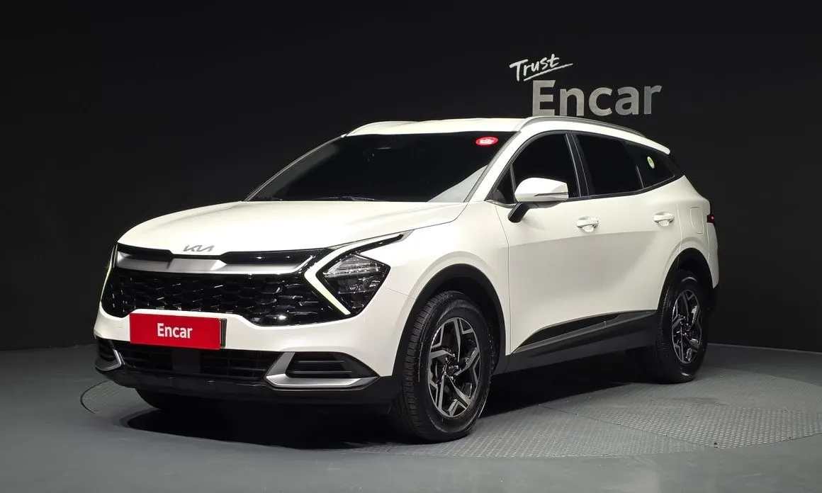 Kia Sportage — фото 1