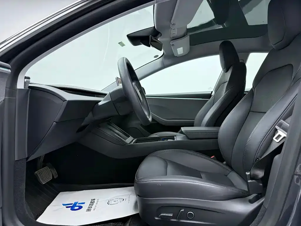Tesla Model 3 — фото 10