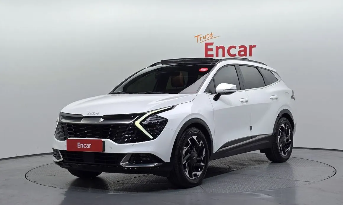 Kia Sportage — фото 1