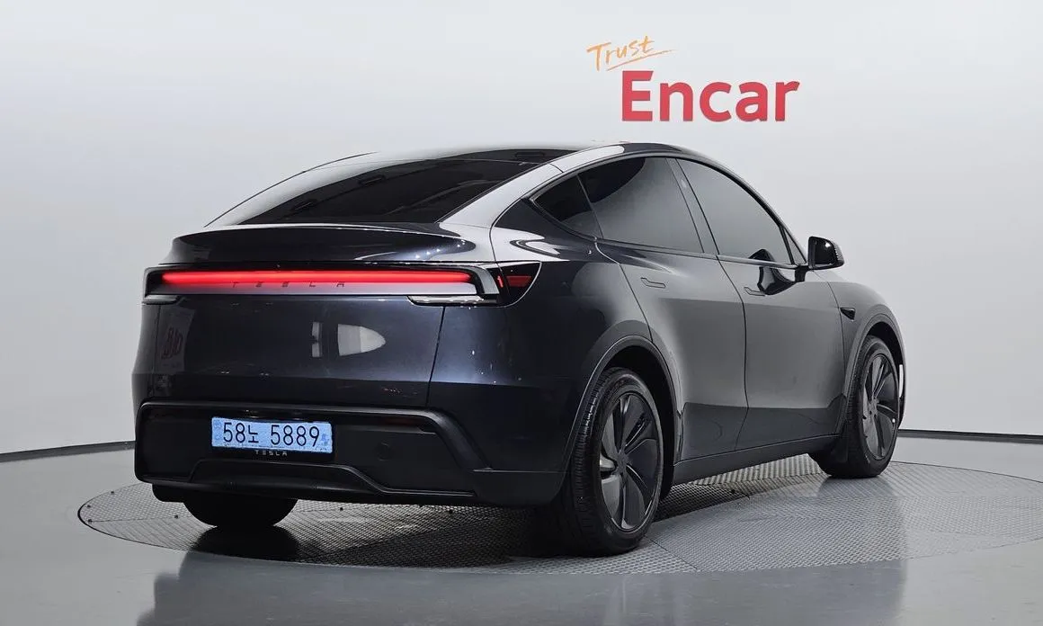 Tesla Model Y — фото 7
