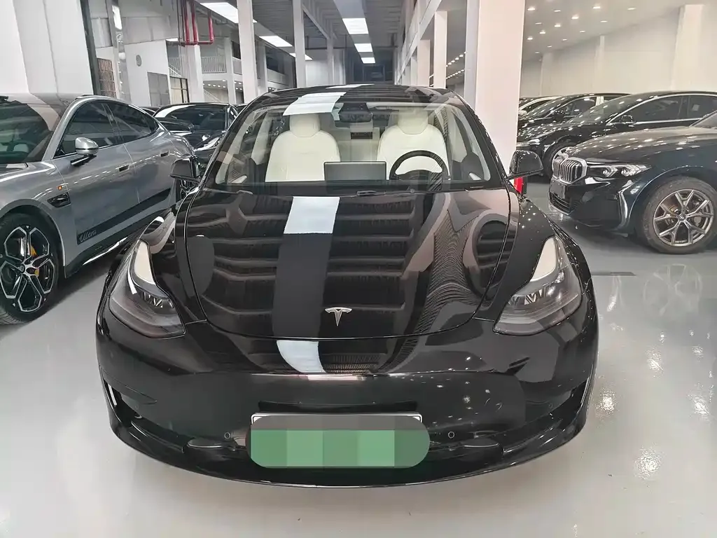 Tesla Model 3 — фото 10