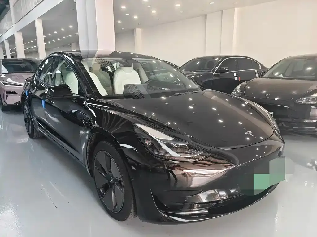 Tesla Model 3 — фото 9