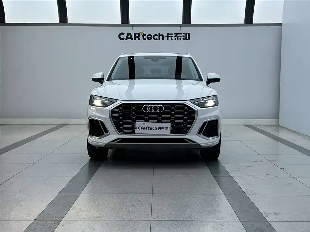 Audi Q5L — фото 5