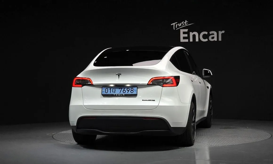 Tesla Model Y — фото 5