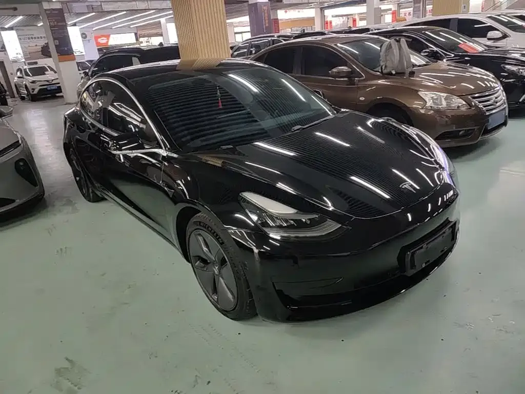 Tesla Model 3 — фото 6