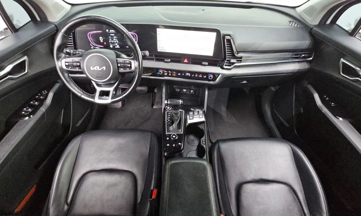 Kia Sportage — фото 8